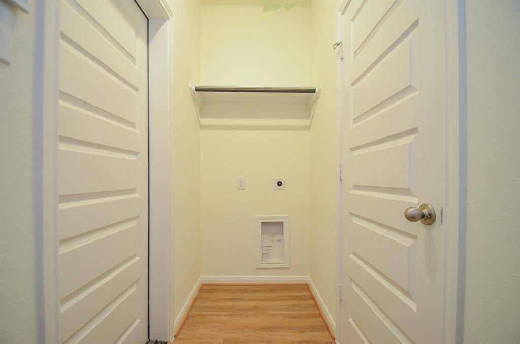 This dedicated utility space offers practical functionality and ample storage potential.