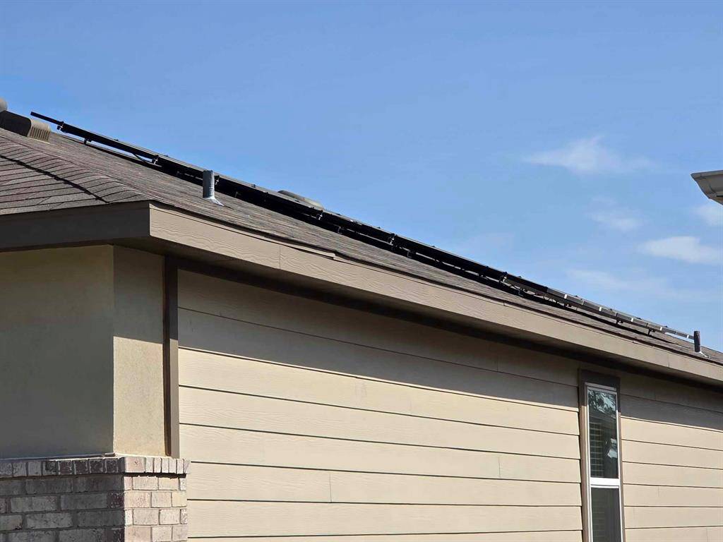 Solar screens will convey with home free and clear