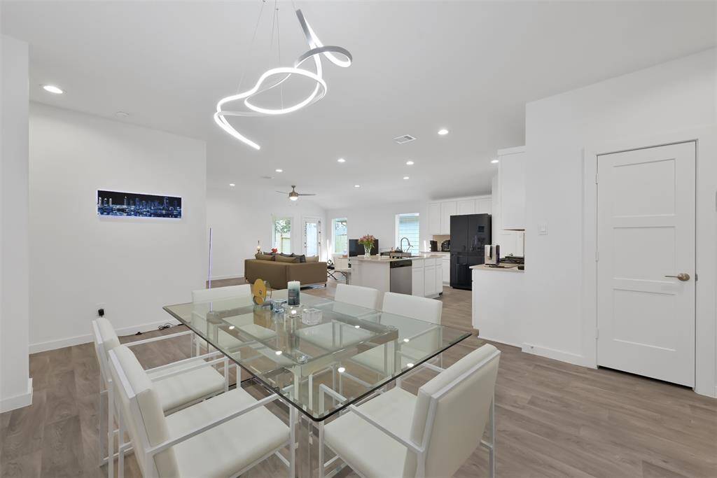 Dining room just off the kitchen open to kitchen and large living room