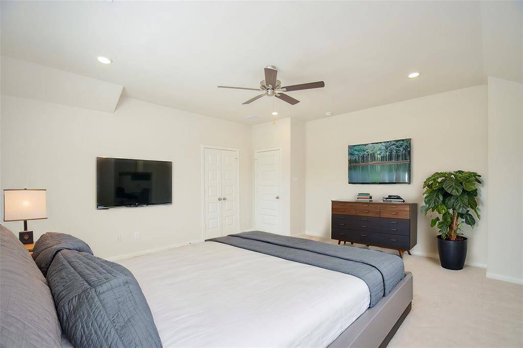 Notice the high ceilings and recessed lighting, adding an airy and modern feel.