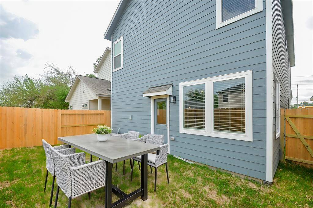 Step into this spacious and private backyard.