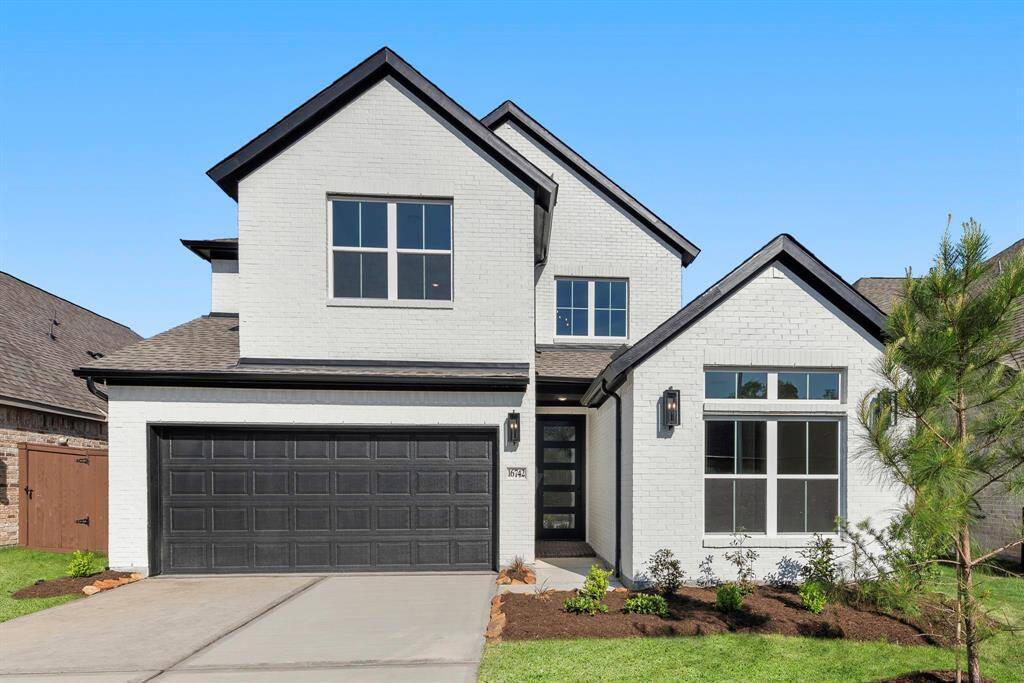 MOVE IN READY!! Westin Homes NEW Construction (Tribeca, Elevation A) Two story. 4 bedrooms. 3 baths. Green grass added to enhance photo.