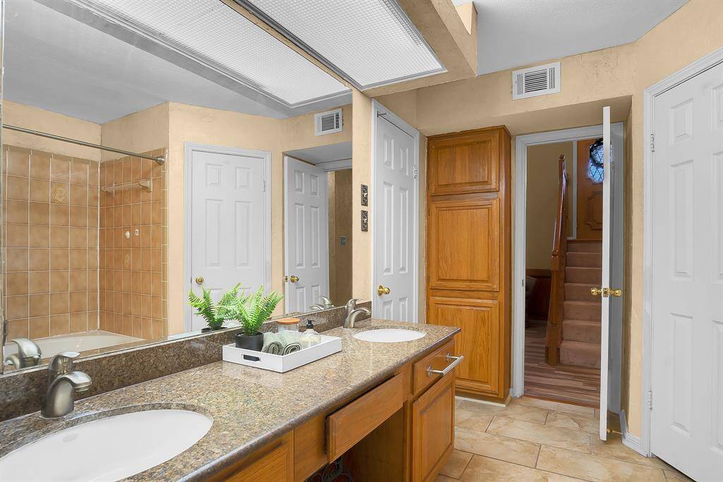 Additional view of the primary bathroom.