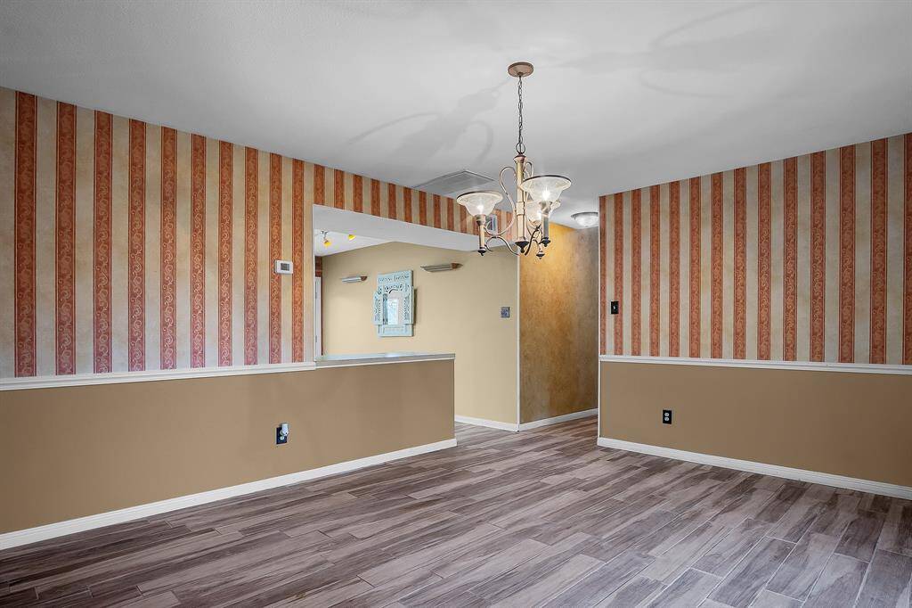 Additional view of the formal dining room opening to the kitchen.