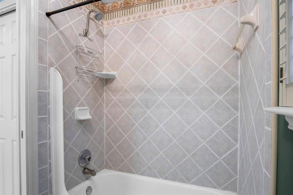 Additional view of the secondary bathrooms recently remodeled shower/tub combo!