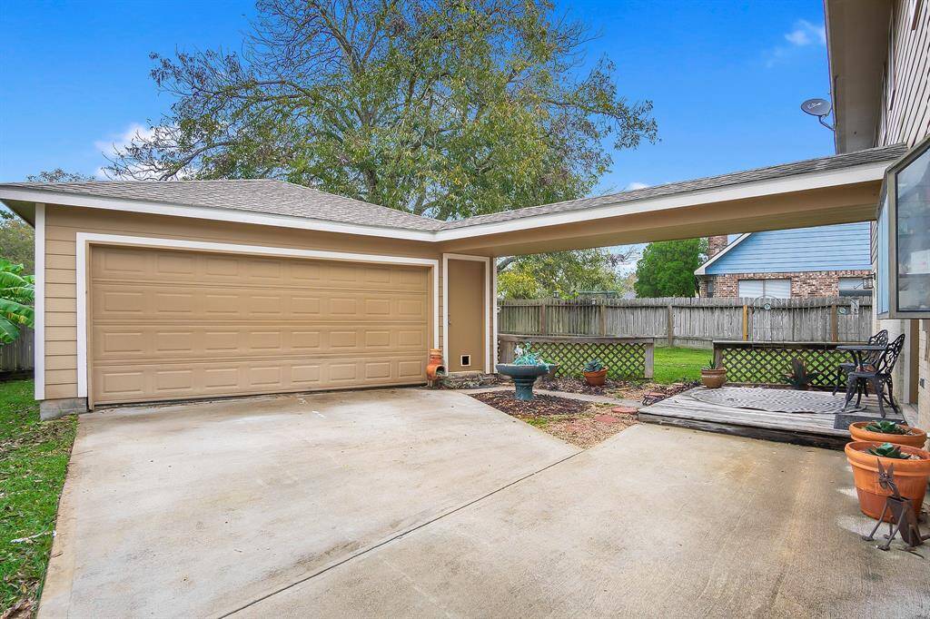 View of the oversized detached 2-car garage.