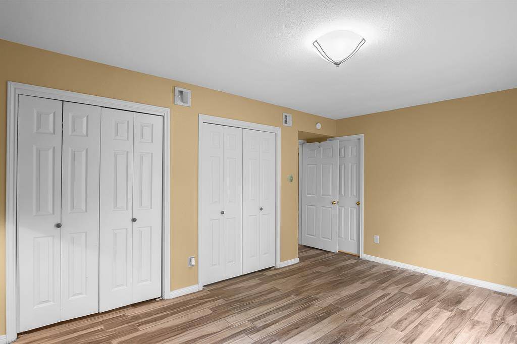 Additional view of the primary bedroom, show casing 2 of the 4 closets!