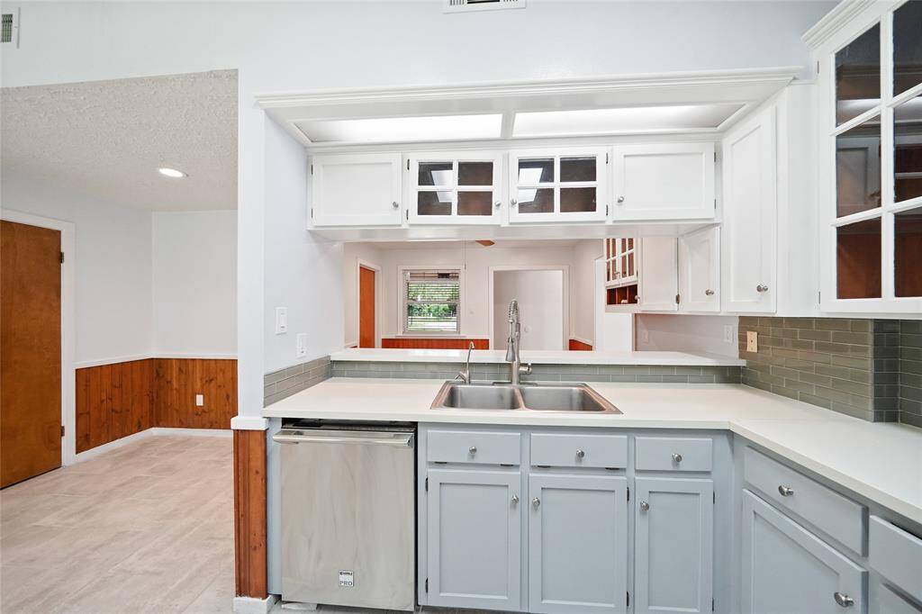 Gorgeous open kitchen with plenty of counter and cabinet space.