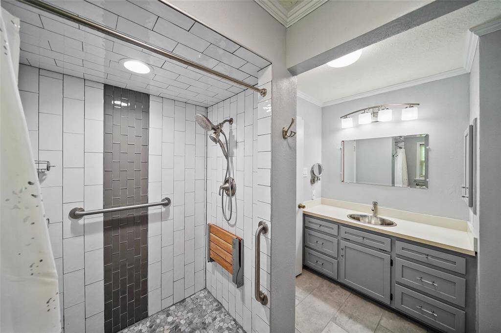 Modern and spacious walk-in shower.