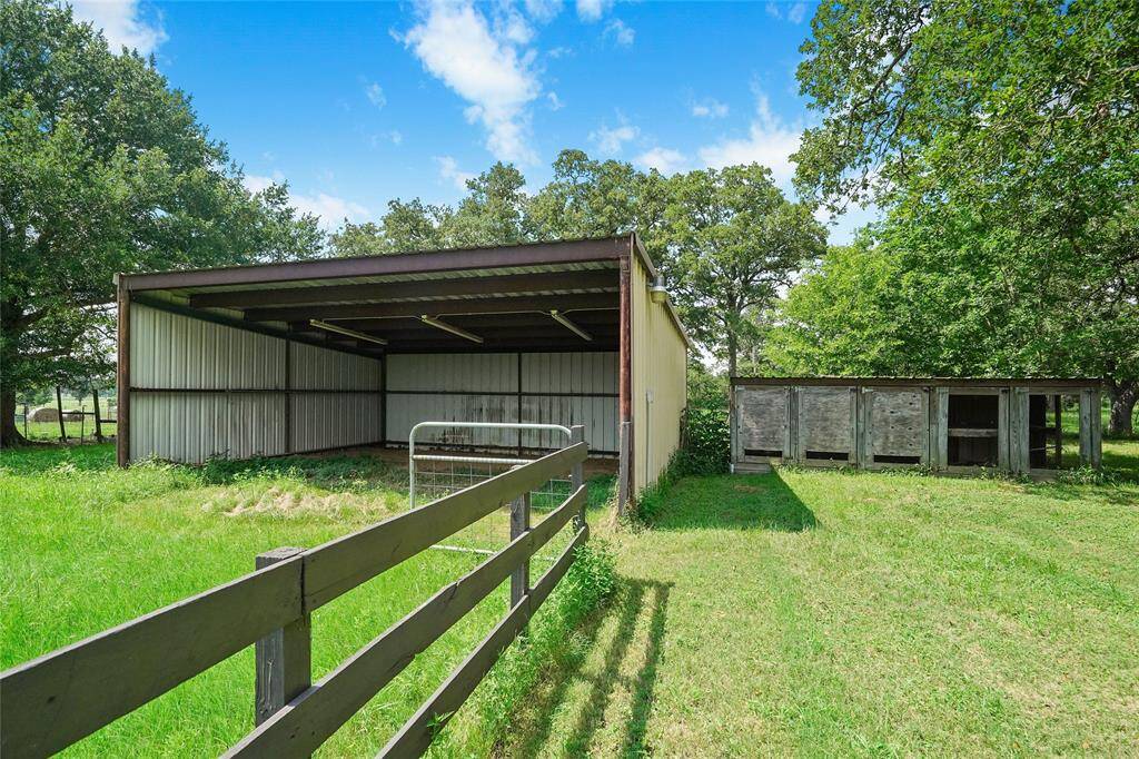 Separate pasture with run in shed and chicken coop.