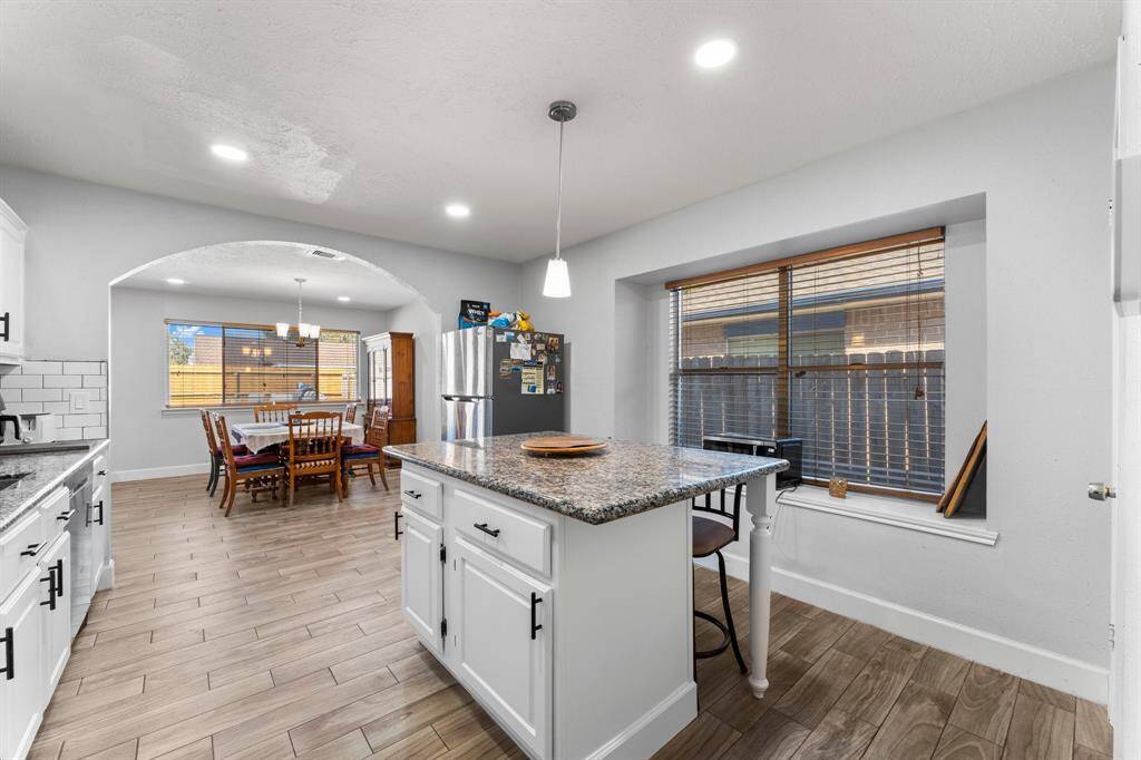 Lovely kitchen with island for lots of counter space.