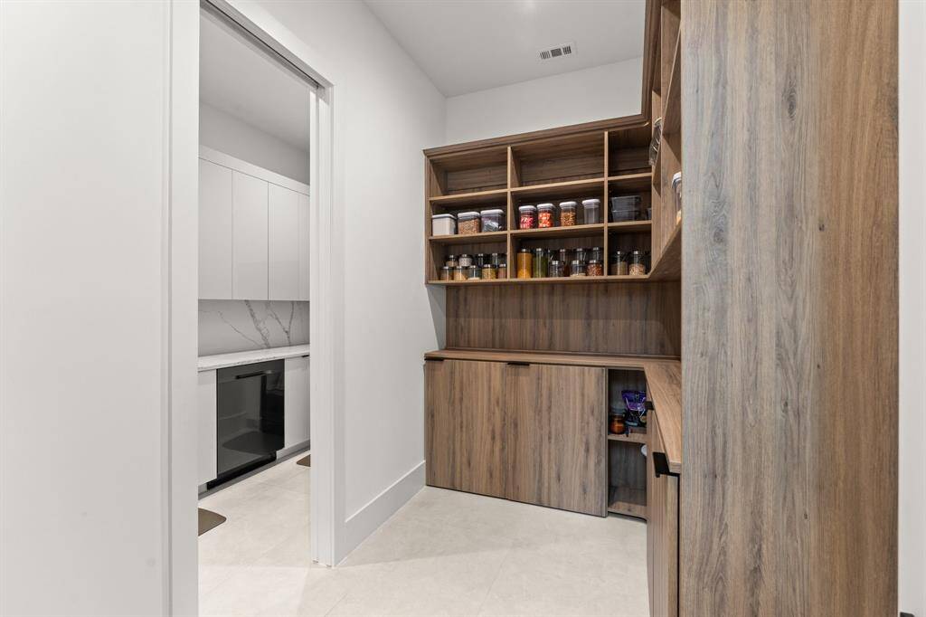 Maximize your space in the Spice Kitchen with these beautifully designed built-in storage and shelving units. Perfect for keeping spices, utensils, and all your kitchen essentials organized and easily accessible. A functional and stylish solution to all your storage needs!
