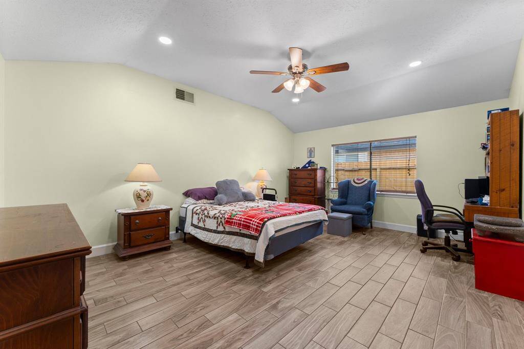 Primary bedroom retreat with ensuite bathroom.