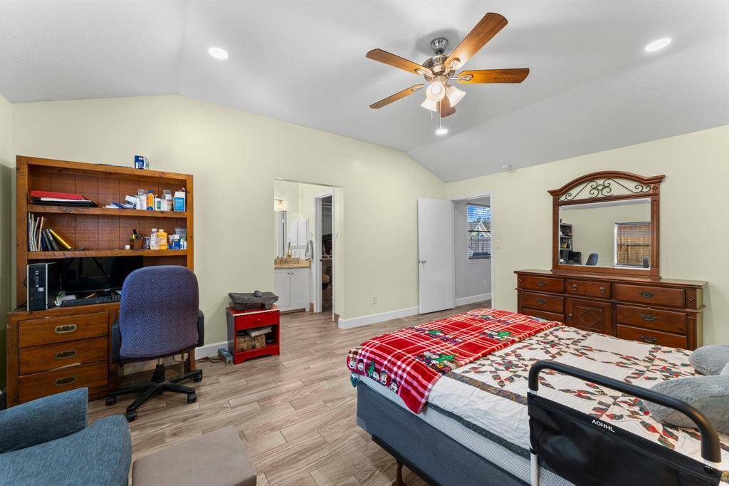 Another view of the primary bedroom.