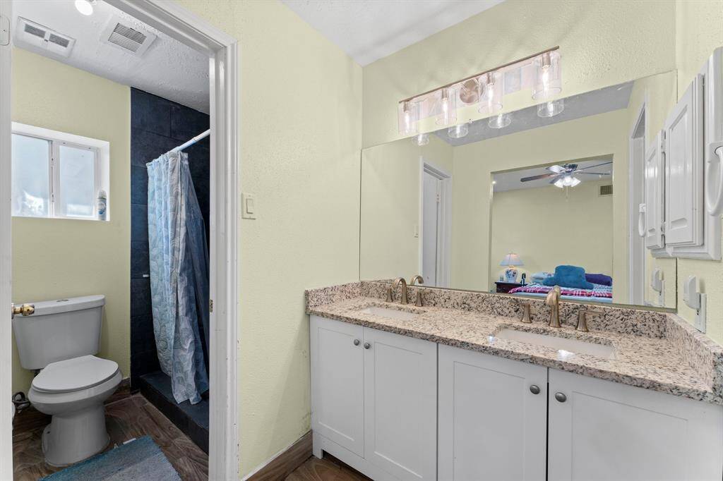 Double vanities with new lighting.