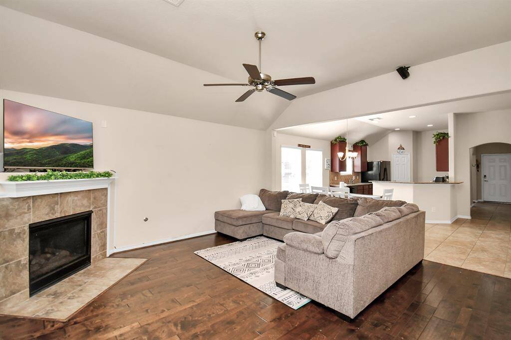 Anchored by a cozy gas fireplace, makes it perfect for entertaining and everyday living.