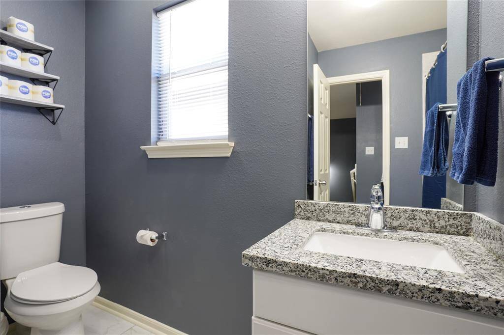 Unit B - Bathroom # 2, upstairs hallway bathroom.