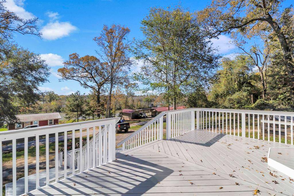gorgeous front porch featuring beautiful water views.