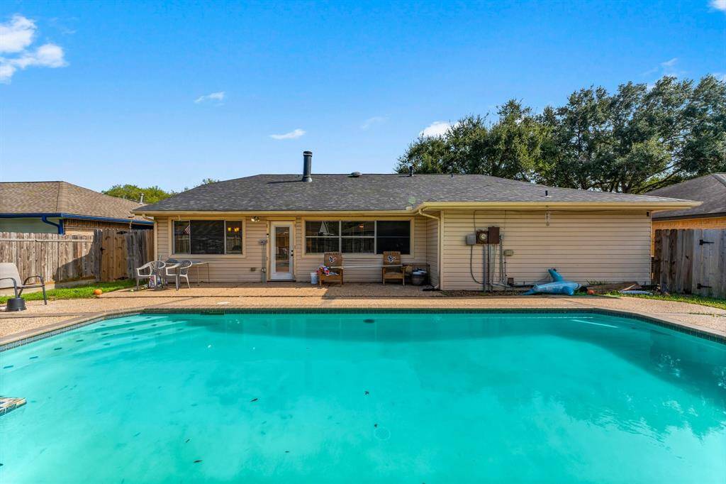 Enjoy your private backyard pool and hot tub.