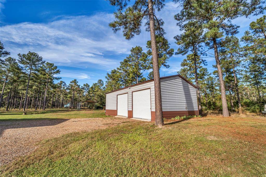 Workshop with 2 car garage and additional storage space