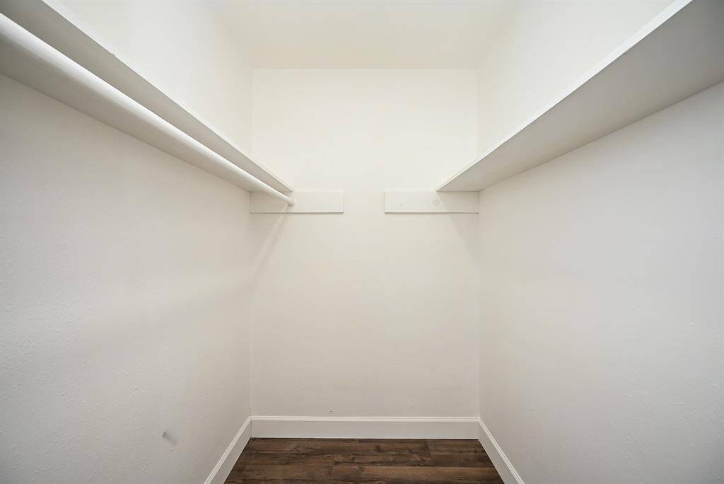 Welcome to your new walk-in closet. It is designed for functionality and style, making it the perfect space for organizing your belongings.