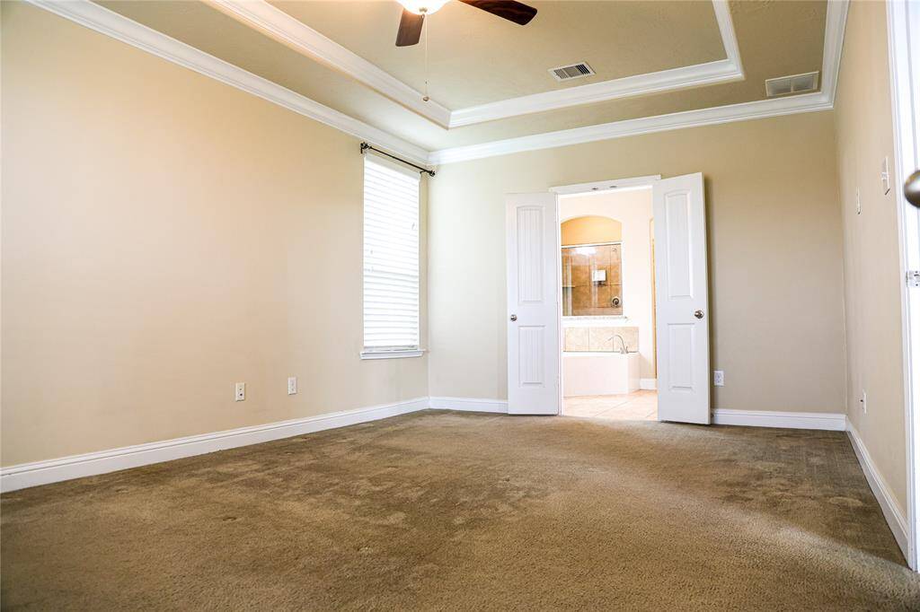 Primary bedroom with Trace ceilings