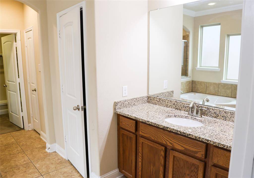 Primary bath view of his sink