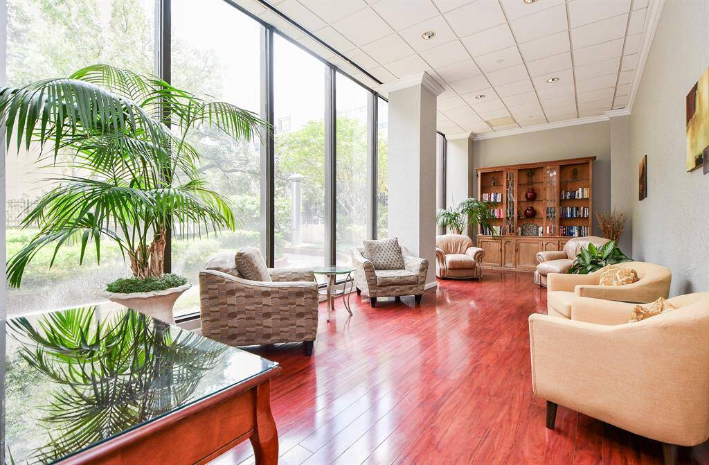 Room to gather with friends overlooking lush courtyard