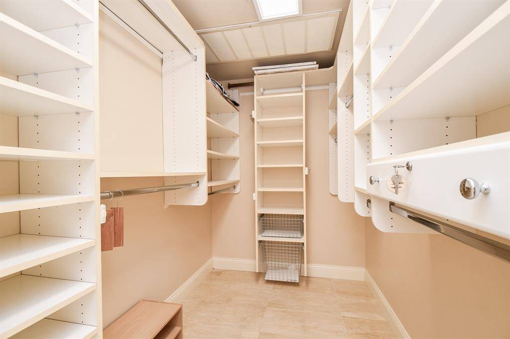 Oversized California style closet with all the cubbies for specialized storage