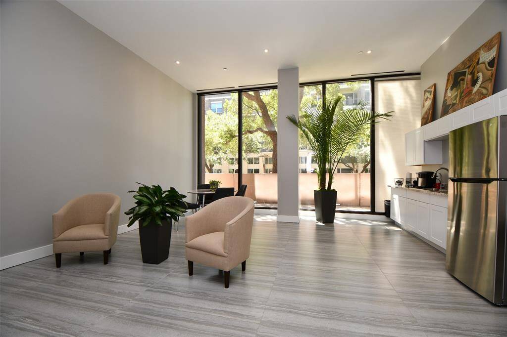 Gathering room. Coffee area with refrigerator