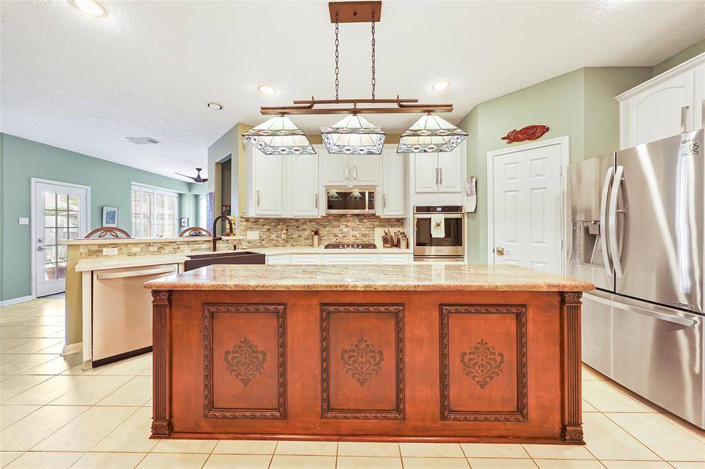 Another view of the kitchen featuring the island