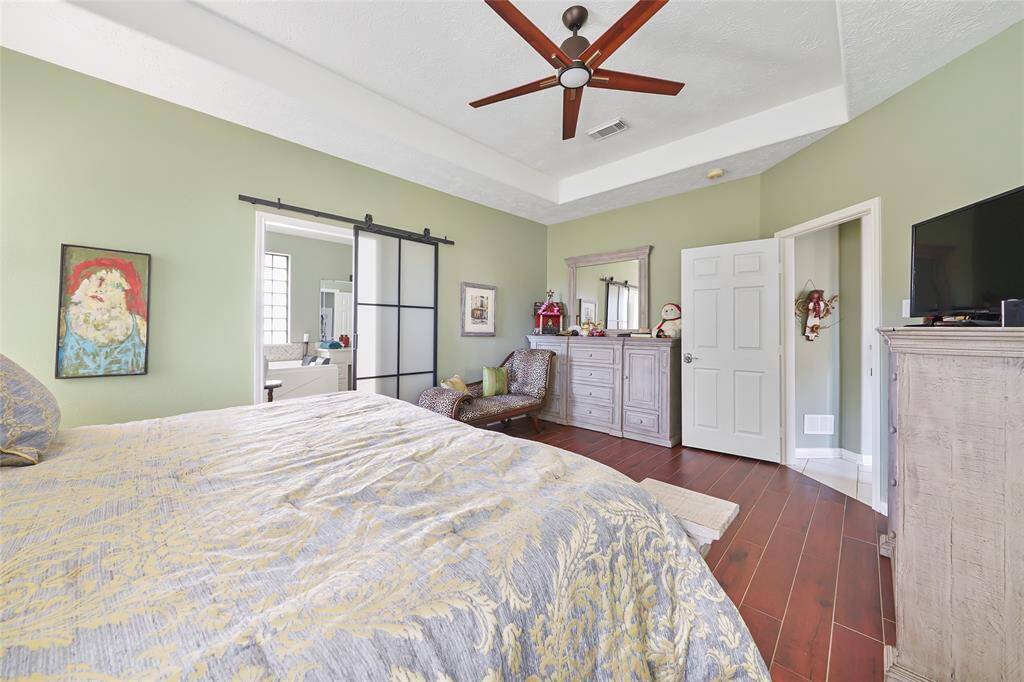 Another view of the primary bedroom