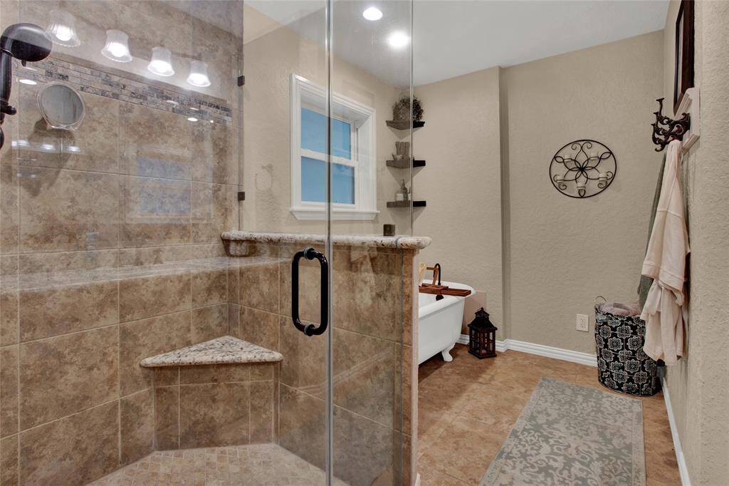 Stunning bathroom renovation, spacious separate shower.