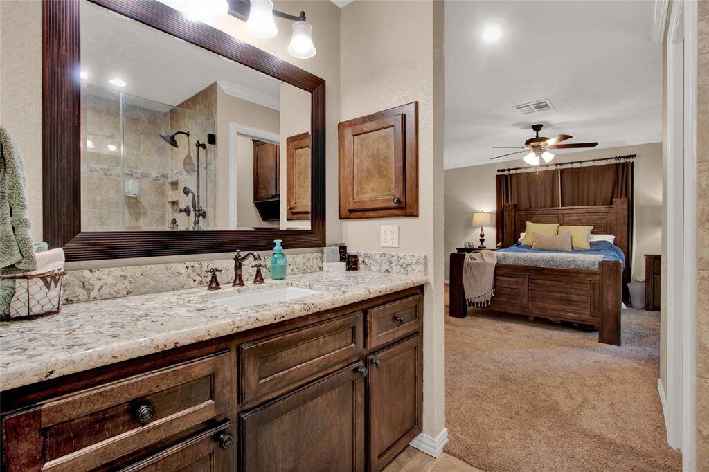Granite countertops and water closet to the right.