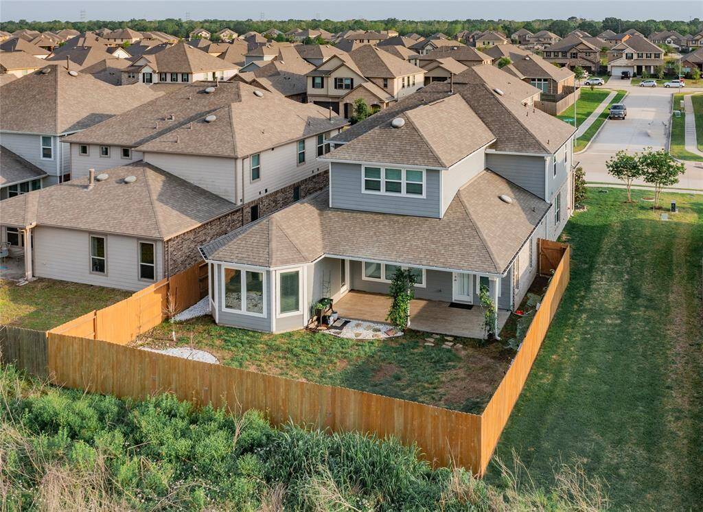 aerial view at a different angle showing the side yard