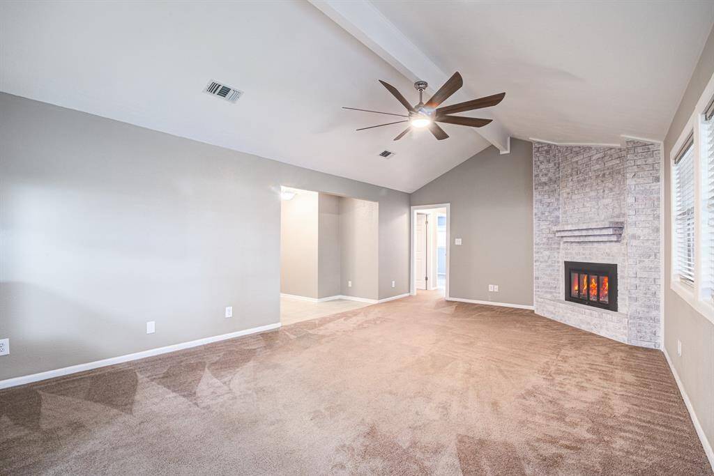 Spacious Living Area with a beautiful fireplace