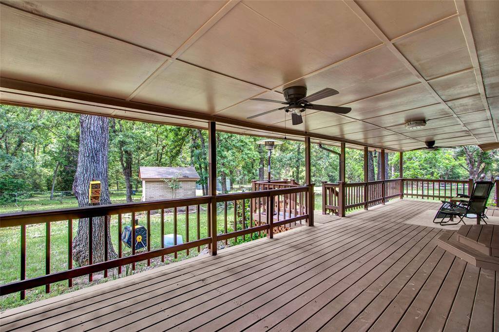 Covered and wired with ceiling fans