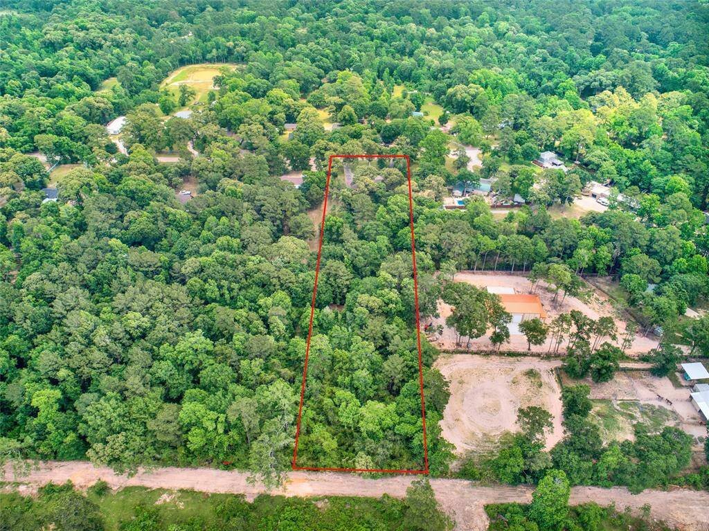 Over 2 acres to spread out and call home! WORK and PLAY!