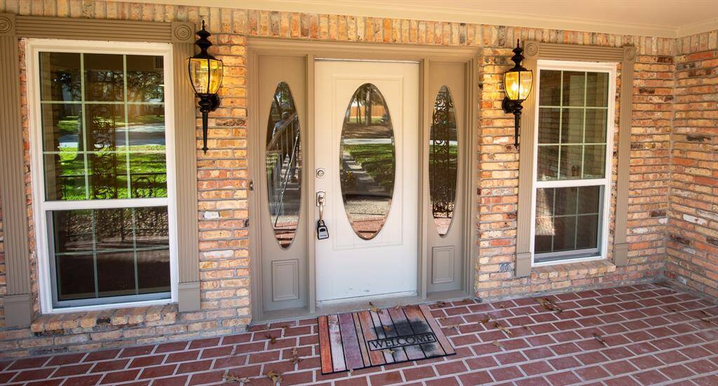 When you enter this home you will find the formal dining room to the left, a spiral staircase leading to the second floor and a bedroom on the first floor to the right. On either side of the staircase hallways lead to the main living area.