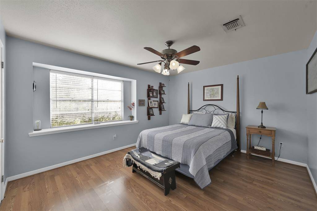 Guest BR #1 features large window for natural light