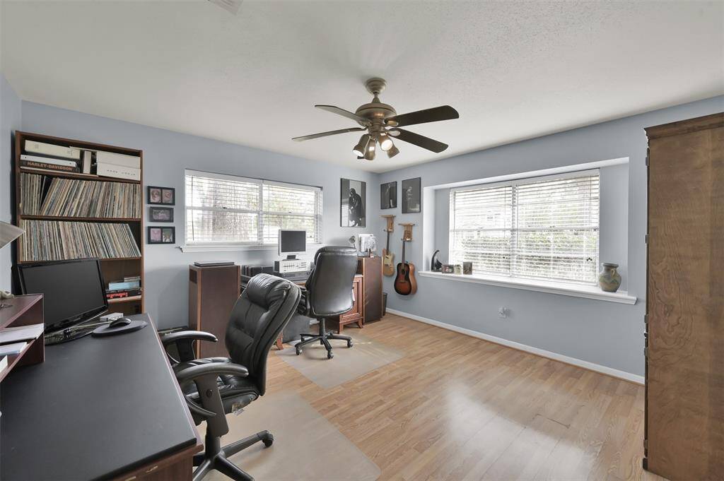 Guest BR #2 currently being used as a home office provides ample space with plenty of natural light