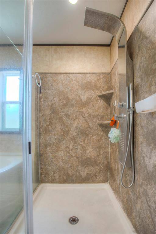 Large, walk-in shower in primary bath