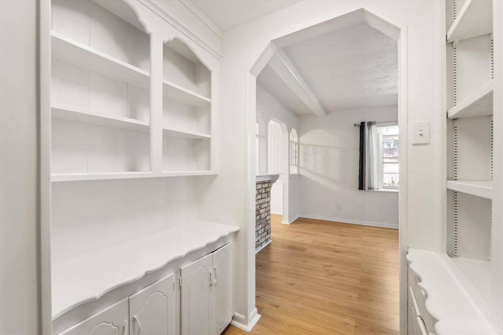 Built-ins all throughout the nook connecting the living area to the downstairs bedrooms.