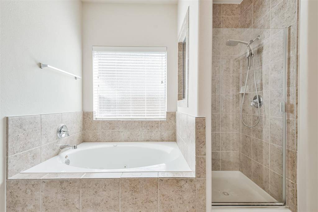 Primary jetted tub and separate shower
