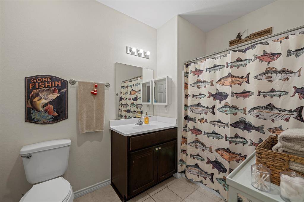 Secondary Bath with shower/tub combo.