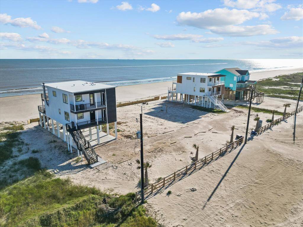 Discover your dream beachfront escape with two modern homes offering breathtaking ocean views. Ideal for relaxation and entertaining, these elevated properties promise unmatched coastal living.