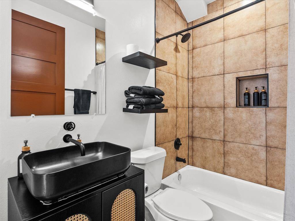 Featuring a sleek, private bath for ultimate comfort and style.