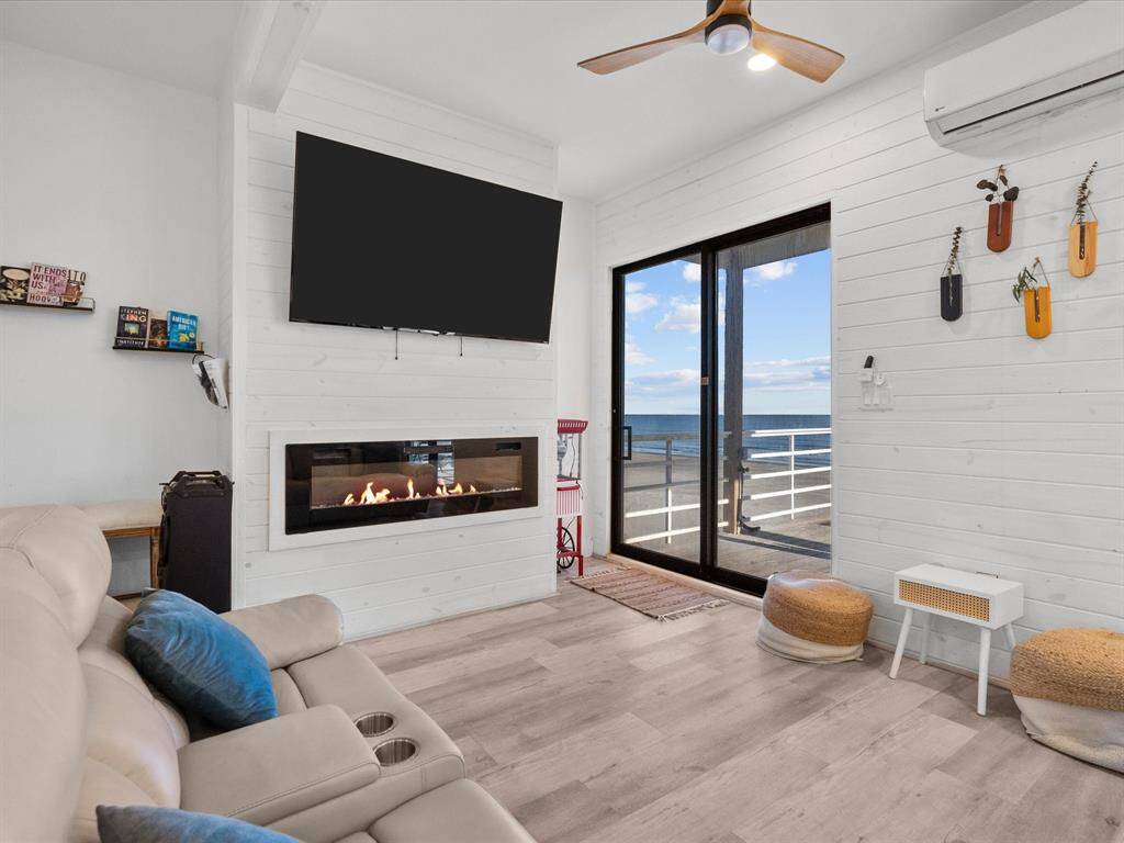 Cozy, modern fireplace perfect for relaxing evenings by the sea.