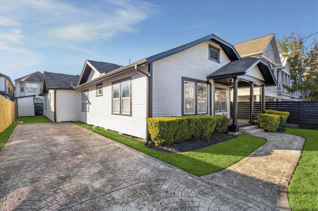 Spacious driveway and fenced front yard!
