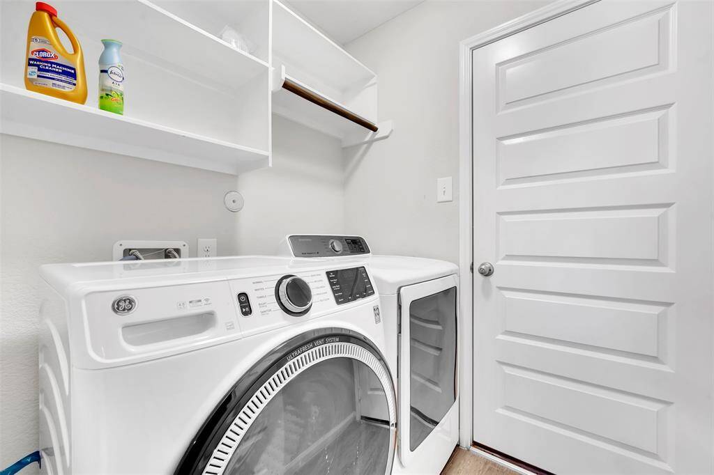 Open thru to the Utility Room. Washer/Dryer stays
